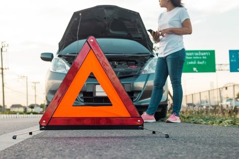 Premium Photo | Broken down car on the road Broken City, Car Breaks, Towing Service, Stop Sign, Jaguar Xj, Roadside Assistance, City Car, Flat Tire, Insurance Policy