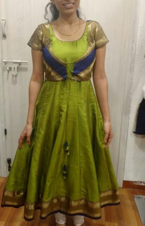 Sai Mitra Fashion Boutique - An elegant  contemporary wonder.  Fusion of Anarkali with overcoat. Contact:0422-4508000 #Green #cotton #silk #creative #pattern #contrast #boutiqueincoimbatore Anarkali With Overcoat, Creative Pattern, Kurta Neck Design, Handwork Embroidery Design, Saree Dress, Girl Dresses, Ethnic Fashion, Green Cotton