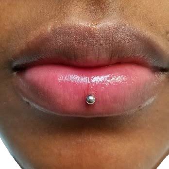 Nose Piercing Two On One Side, Lip Piercings Black Women, Bottom Lip Piercing Middle, Cheek Piercing Upper, Cute Facial Piercings, Types Of Body Piercings, Ashley Piercing, Different Ear Piercings, Cute Nose Piercings