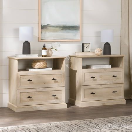 Lack of storage in your bedroom will no longer be a problem after purchasing this set of Walker Edison Traditional 2-Drawer Nightstands. With two drawers for closed storage and one open storage shelf on each piece, you will have many options to store items within reach of your bed. Wood accents around each drawer bring a relaxed vibe no matter where it is placed. These side tables also make great organizational options for living room storage and a place to display lamps, house plants, and other White Oak Nightstand, Modern Bedroom Wardrobe, Nyc Rooms, Beautiful Bed Designs, Nightstand Set, Bedroom Cupboard, Nightstand Decor, Nightstand Set Of 2, Bedroom Cupboard Designs