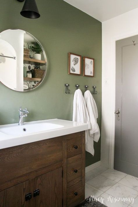 Sage Green Bathroom Mirror, Small Bathroom Green Accent Wall, Green Bathroom Dark Wood, Green In Bathroom Ideas, Green Accent Wall Bathroom Ideas, Bathroom Color Wall, All Green Bathroom Ideas, Light Olive Bathroom, Rustic Retreat Bathroom