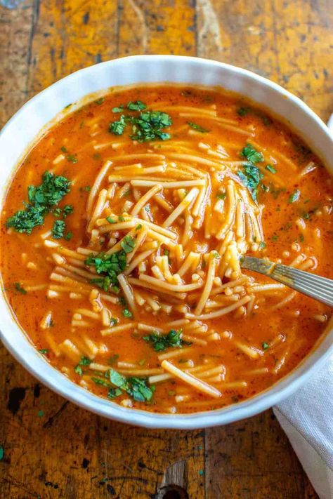 An authentic Sopa de Fideo recipe, you will be surprised how easy, quick and delicious this soup is. It’s one of Mexico’s most classic soup recipes made with tomatoes, noodles, garlic, and broth. Loved by kids and adults alike. Vegan Fideo Soup, Tomato Soup And Noodles, Tomato Bullion Recipes, Soups Without Meat, Chicken Fideo Soup, Authentic Fideo Recipe Mexican, Mexican Pasta Soup, Soups To Make When Sick, Simple Soups Easy