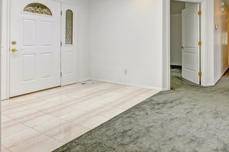 Carpet To Tile Transition, Floor Transitions, Tile Transition, Entryway Tile, Pebble Floor, White Carpet, Flooring Store, Grey Tiles, Wall Carpet