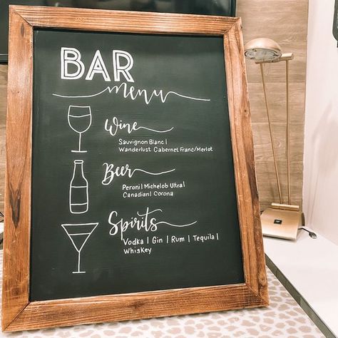 Jaclyn | Calligraphy + Signs on Instagram: "Cheers 🥂! Close up of this beautiful bar menu chalkboard sign before I painted over it. ​​​​​​​​ ​​​​​​​​ #rental #barmenu #chalkboard #chalkboardsign #barmenu #wedding #calligrpahy #moderncalligraphy #handlettering #weddingsign #custom #custommade #eventsignage #barsignage #weddingdecor #weddingsignage #weddinginspo" Wedding Bar Sign Chalkboard, Chalkboard Drink Sign, Chalkboard Bar Menu Signs, Drinks Chalkboard Sign, Bridesmaid 2023, Menu On Chalkboard, Bar Menu Chalkboard, Bar Chalkboard Sign, Bar Chalkboard Ideas