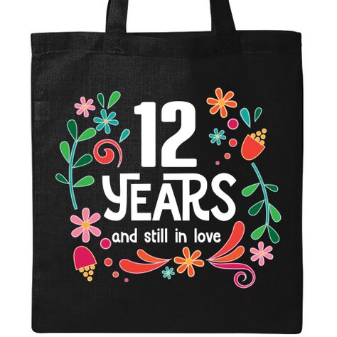 12th wedding anniversary Tote Bag has beautiful flowered border with 12 years and still in love couples slogan $14.99 #anniversarygift #12thAnniversary #anniversary #anniversarytotebag www.weddinganniversarytshirts.com Happy 12th Anniversary, 12th Wedding Anniversary, 10th Anniversary Party, 11 Year Anniversary, Engagement Quotes, Happy Anniversary Quotes, Love Slogan, 12th Anniversary, 10th Wedding Anniversary