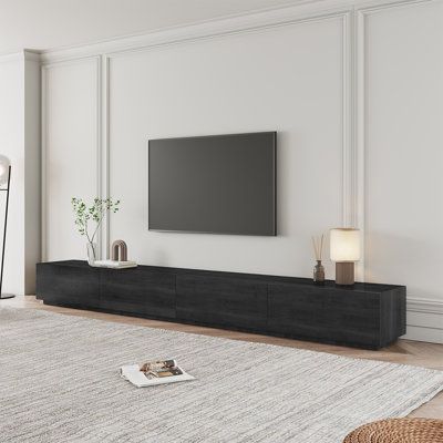 75 In Tv Stand, Long Low Entertainment Unit, Long Tv Console Modern, Long Tv Unit Design Modern, Minimalist Media Console, 85 Inch Tv On Wall, Long Tv Stand Ideas, Tv Console Long, 85 Inch Tv Living Room