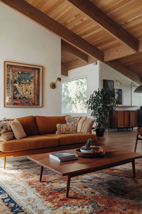 ♥ Are you dreaming of a cozy and stylish living room with a touch of 70s interior design? Step into this Mid Century Modern living room, a blend of boho and modern aesthetics. From the earthy tones to the accent walls, this space screams "cozy living room goals". ✨🌿 #mcmLivingRoom #70sInteriorDesign #CozyLivingRoom #NeutralLivingRoom #LivingRoomInspiration Mid Century Indian Living Room, Boho Great Room, Farmhouse Colorful Living Room, Midcentury Ranch Living Room, Mid Century Modern Living Room Cream Couch, Living Room Designs 70s, Rust Velvet Couch Living Room Ideas, Natural Eclectic Decor, Chalet Style Living Room