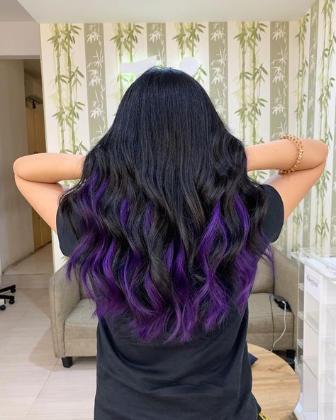 All The “It” Girls Are Rocking Black Hair With Peekaboo Highlights Black Hair With Peekaboo, Black Hair With Peekaboo Highlights, Purple Underneath Hair, Purple Peekaboo Hair, Purple Hair Streaks, Purple Black Hair, The It Girls, Peekaboo Hair Colors, Purple Hair Highlights