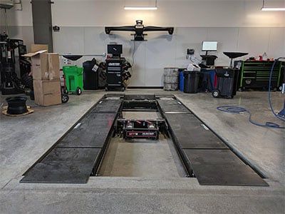 The in-ground Hunter alignment rack has a smooth and level on/off approach, making it friendly to stock height and lowered cars. Wheel Alignment Shop Design, Car Wheel Alignment, Lowered Cars, Prescott Az, Subaru Models, Wheel Alignment, Car For Sale, Garage Design, Car Finance