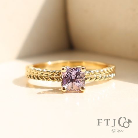 This Ceres Solitaire is soaking up the sun! It features our gorgeous 'Ceres' wheat-sheaf textured band, with a 'petal' style setting and a unique lilac-coloured square sapphire. We started by offering our Ceres style as a wedding band, but as is often the case, someone looked at the wedding band and said, "Can I have an engagement ring version of this?" of course, we said yes! Now you can order your own Ceres Solitaire online, or in-store. 💍😍✨ . This is a Ceres Solitaire made in our 18K AKARA... Lavender Engagement Ring, Lavender Engagement, We Said Yes, Wheat Sheaf, Lilac Color, Fashion Set, Wedding Band, Wheat, A Wedding