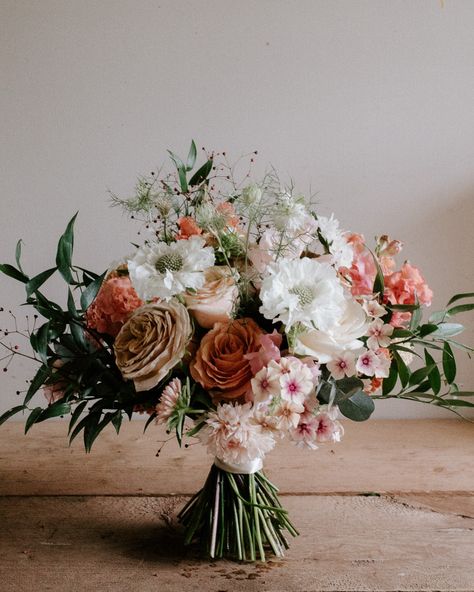 For G. A Bridal bouquet in late Summer oranges, creams and cappuccino. Wild and romantic in style, with movement as you move. Such beautiful and interesting stems from @thetwiggeryflowercompany Those phlox were the crowning glory of this bouquet. Married at one of the most stunning parish churches we have ever seen, G & J said their vows to each other, with love. Starting their happily ever after. #bridalflowers #beidalbouquet #bridestyle #bridal #weddingdlowers #wildandromantic #burntor... Late Summer Bridal Bouquet, Phlox Flowers, Bridal Bouquet Summer, Bride Style, Late Summer, Happily Ever After, Ever After, Cappuccino, Burnt Orange