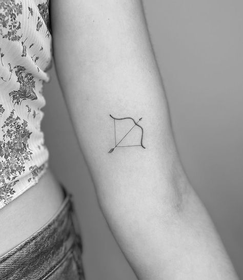 Archer Tattoo Minimalist, Mini Bow And Arrow Tattoo, Mini Arrow Tattoo, Small Tattoos Arrow, Minimalist Bow And Arrow Tattoo, Greek Bow And Arrow Tattoo, Cupid’s Bow Tattoo, Arrow Tattoo Aesthetic, Heart Bow And Arrow Tattoo