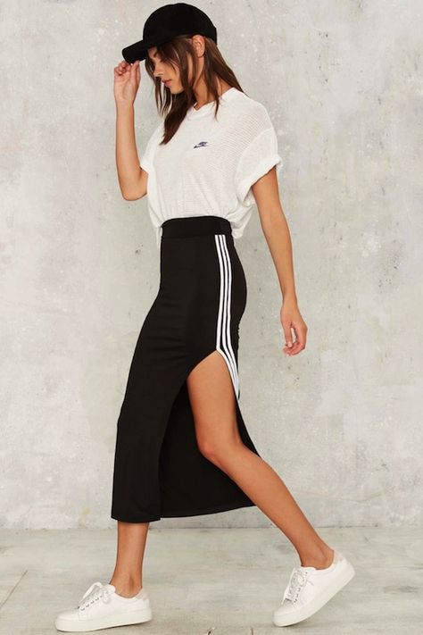 style a graphic tee with a sporty skirt for an elevated and stylish look. Sneakers Fashion Outfits, Maxi Rok, Kpop Style, High Street Fashion, Black Graphic Tees, Striped Skirt, Skirt Midi, Virtual Fashion, Athleisure Fashion