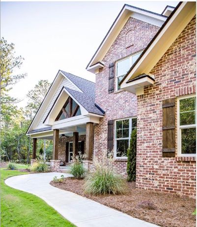 Brick Farmhouse Exterior, Red Brick House Exterior, Red Brick Exteriors, Brick Farmhouse, Types Of Bricks, Wood Columns, American Farmhouse, Red Brick House, Brick Exterior House