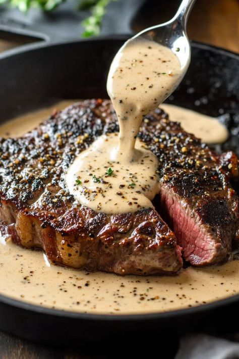 Savor a perfectly seared Bavette steak cooked in a cast iron skillet, topped with a rich whiskey garlic cream sauce for an indulgent, meal. Steak And Shrimp Garlic Cream Sauce, Steak With Whiskey Cream Sauce, Cast Iron Bavette Steak With Whiskey Garlic Cream Sauce, Florentine Steak Recipe, Whiskey Garlic Cream Sauce, Steak With Ghostly Bourbon Garlic Cream Sauce, Skillet Steak Cast Iron, Haunted Bourbon Garlic Cream Sauce, Steak With Haunted Bourbon Cream Sauce