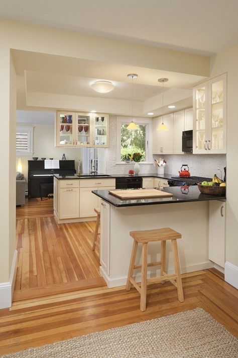 10 Ways to Disguise a Kitchen Soffit — Kitchen Design | The Kitchn - This is a cool way to solve a problem - too much room between cabinets and ceiling - and add a little drama at the same time. Soffit Ideas, Small U Shaped Kitchen, Kitchen Soffit, U Shaped Kitchen, Kitchen Ceiling, Kitchen Remodeling Projects, Kitchen Plans, Large Kitchen, Room Remodeling