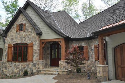 colorful exterior stone | green color with stone and wood for house exterior Cottage Exterior Colors, Lake Houses Exterior, Cottage Exterior, Wooden Shutters, Exterior Paint Colors For House, Casa Exterior, Wood Shutters, Exterior Stone, House Paint Exterior