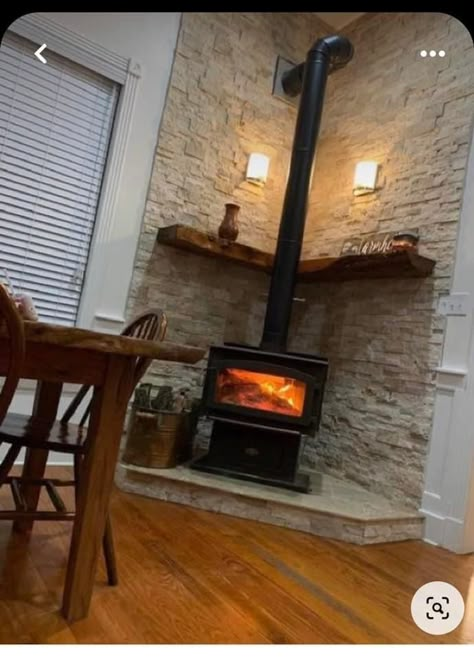 Rustic Woodburning Stove Ideas, Rock Behind Wood Stove, Pellet Stove Brick Wall, Wood Stove Steamer Scents, Corner Wood Burning Fireplace Ideas, Corner Gas Stove Fireplace, Wood Burner Corner, Wall Behind Pellet Stove Ideas, Wood Stove Corner Ideas Living Room