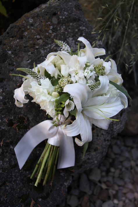 This was an all white bouquet with lilies we created, but can do something similar to this with stargazers lilies, maybe some soft pink and cream garden roses..... White Tiger Lily Bouquet, Stargazer Wedding Bouquet, Wedding Bouquet With Lilies, Lily Bride Bouquet, Bridal Bouquet Lilies, White Lilies Bouquet, Bridal Bouquet Lily, Lilly Bouquet Wedding, Lily And Rose Bouquet