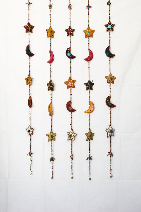 Title - Handcrafted Decorative Wall/Door Window Hanging Bells For Home Office Wedding Festival Decoration                                                                                                      Perfect Gift For Any Occasion About This Item:-  *It is a traditional item made up of fabric, metal bells and artificial pearls. Each bell is of different color and has been handcrafted and added to string with other props. This designer wall hanging definitely is an exclusive choice for your home décor. *Very appealing and eye catching enhances the decor value of the house, office , hotel  etc *Laser cut good quality finish and longevity *Designed to give your house traditional yet contemporary look *Exclusive Gift For Festival, Corporate Gift ,Wedding , House warming , Anniversary and Apartment Wall Decor Aesthetic, Over Bed Hanging Decor, Spanish Aesthetic Bedroom, Crafts To Hang On Your Wall, Mystical Bedroom Decor, Home Decor Whimsical, Vintage Wall Decoration, Windchime Aesthetic, Whimsical Boho Decor