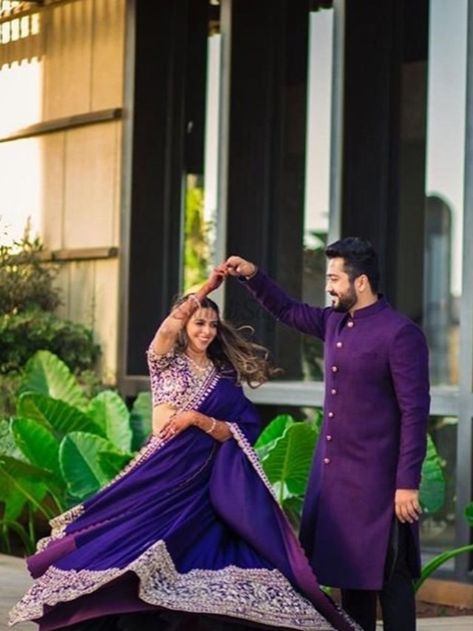 Colour Purple screams elegance and personifies grace. Check this couple's matching wedding outfit. If you are planning your intimated wedding definitely take notes from their wedding.  #indianwedding #shaadisaga #intimatewedding #bridallehenga #matchingindianweddingoutfit #brideandgroomcoordinate #purplelehenga #rachleviru Purple Kurta Men Indian Weddings, Purple Couple Outfits Indian, Couple Indowestern Outfits, Couple Twinning Outfits Indian Wedding, Couple Matching Outfits Indian Wedding Reception, Couple Matching Saree And Kurta, Matching Reception Outfits, Purple Colour Kurta For Men, Matching Outfits For Couples Wedding