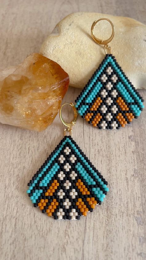 This listing is for a digital pattern of my original diamond brick stitch beaded earring pattern called Harvest Moon. Your purchase does NOT include instructions or supplies, but you can find tutorials for Brick Stitch on ton my YouTube channel, https://www.youtube.com/@snailsandfairydust The finished size of one earring is 1.25 x 1.5 inches, and this pattern was designed for size 11 Miyuki Delica seed beads, which is what I recommend for best results. However, if you use different beads, please note that the sizing will vary. With your purchase, you will receive a 3 Page PDF with a visual beading chart, a word chart, supply list and the exact bead count needed as well as the product numbers for the specific size 11 Delica beads used in the design. I can't wait to see what you create. Happ Brick Stitch Earrings Tutorial Free Pattern, Seed Bead Jewelry Patterns Tutorials, Genie Jewelry, Seed Bead Patterns Free Earrings, Bead Stitching Patterns, Delica Beaded Earrings, Beading Earring, Brick Stitch Beading, Thread Projects