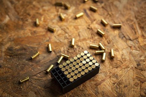 This sports stock photo features guns, shells on the ground, and bullets on the table. Saint Pierre And Miquelon, Ivory Coast, This Is Us Quotes, On The Ground, My House, The Table, Quote Of The Day, Shells, Sports