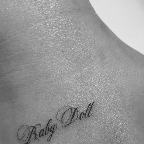 Mikella Blue on Instagram: "baby doll ♡  -  For booking click link in bio  -  #tattoo #losangeles #MikellaBlue #tattooartist #ladytattooer #fineline #blackandgrey #script #babydoll" Doll Tattoo Word, Babydoll Tattoo Lettering, Baby Doll Tattoo, Babydoll Tattoo, 24 Tattoo, Tattoos For Baby Boy, Ethereal Tattoos, Cherry Tattoo, Tattoo For Baby Girl