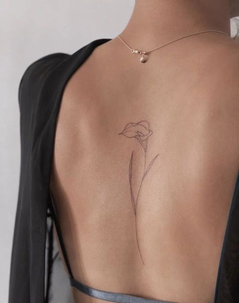 Womens Simple Back Tattoos, Calla Lily Spine Tattoo, Spine Leaves Tattoo, Dainty Hip Bone Tattoo, Single Flower Spine Tattoo, Simplistic Back Tattoos, Small Tattoos Inside Arm, Minimalist Tattoo On Back, Dainty Flower Back Tattoo