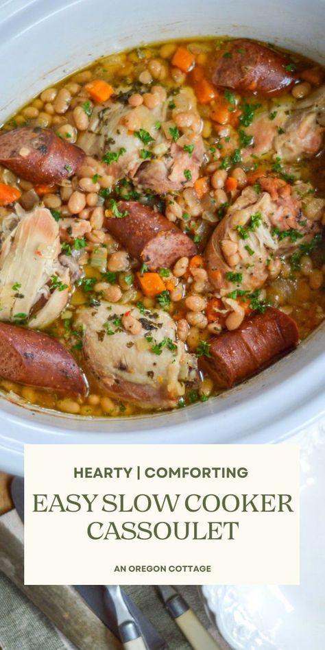 Less involved than the traditional French version but still full of all the amazing flavor, this slow cooker cassoulet recipe made with chicken and sausage is easy enough to make for busy weeknights, and special enough to serve to guests. Add this to your menu ASAP! Slow Cooker Cassoulet, Slow Cooker Meat And Veggies, Chicken And Sausage Crockpot, Sausage Stew Slow Cooker, Greenpan Slow Cooker Recipes, Cassoulet Recipe French, Cassoulet Recipe Slow Cooker, Sausage Slow Cooker Recipes, Stew Recipes Slow Cooker