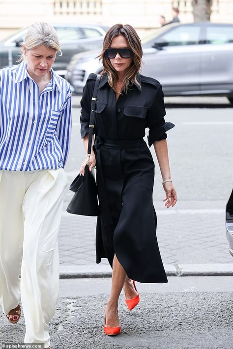 Long Black Shirt Dress Outfit, Black Dress Outfit Work, Black Dress Orange Heels, Black Shirt Dress Outfit Classy, Orange Heels Outfit Classy, Black Shirt Dress Outfit Casual, Victoria Beckham Style 2022, Victoria Beckham Style Dresses, Long Shirt Dress Outfit