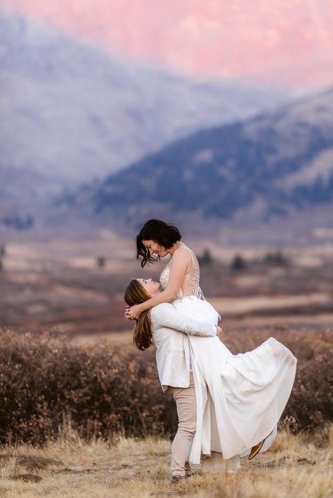 Lesbian elopement inspiration brought to you by Josie V Photography. This elopement took place on top of the Colorado Rocky Mountains at sunset. These two posed in a carefree and fun manner and their love truly shown through. Mountain elopement inspiration, Colorado elopement ideas, Colorado elopement locations, gay wedding ideas, lesbian wedding, lesbian love, lesbian couple, lesbian elopement photos Unique Lesbian Wedding, Lesbian Wedding Picture Ideas, Lesbian Mountain Wedding, Small Lesbian Wedding, Lesbian Elopement Ideas, Wedding Lesbian Couple, Lesbian Wedding Pictures, Wedding Photos Lesbian, Lesbian Wedding Photo Ideas