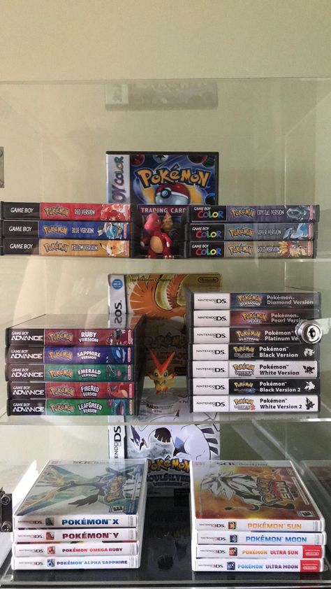 The Gangs All Here: My Pokémon Video Game Collection! Retro Game Collection, Gaming Collection Display, Video Game Nerd Aesthetic, Pokémon Game Room, Pokemon Collection Room, Pokemon Game Room, Pokemon Room Aesthetic, Pokemon Collection Display, Video Games Wallpaper