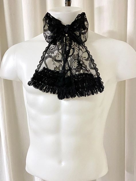 Black Lace Ascot or Neck Tie in Sheer Floral Lace with Ruffled Lace Details for Gothic Cosplay, Formal Events, Halloween https://etsy.me/3REjc4o #blacklaceascot #gothic #misspussinboots #handmade #halloween #costumeascot #shopsmall #pussybowtie Gothic 1920s, Gothic Cosplay, Vampire Witch, Wedding Tux, Collection Ideas, Lace Tie, Grand Junction, Theme Halloween, Lace Bows