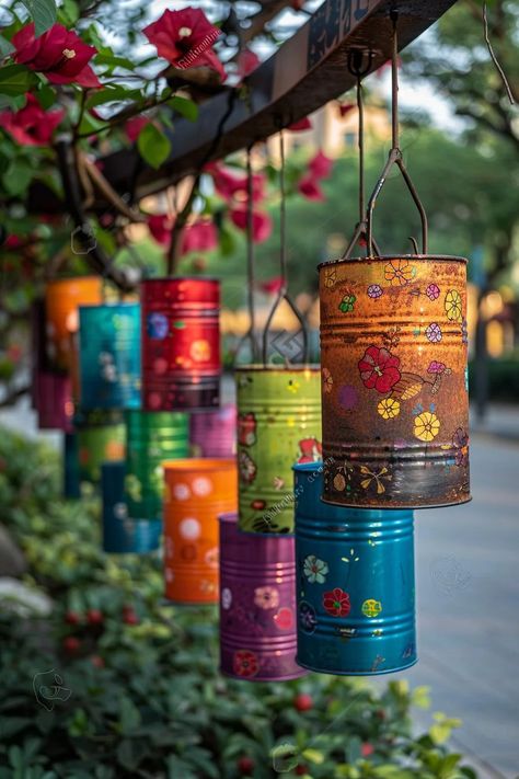 33 Creative DIY Yard Art Ideas You’ll Love To Craft 29 Upcycled Windchimes Diy, Painted Tin Cans Diy, Recycled Tin Can Crafts, Recycle Decoration Ideas, Fall Yard Decorating Ideas, Tin Can Wind Chimes Diy, Tiny Porch Decorating Ideas, Diy Festival Decorations, Recycle Art Projects