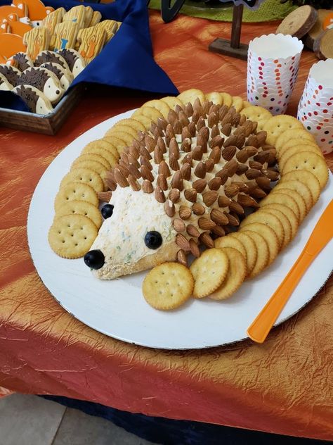 Hedgehog cheeseball Woodland birthday Hedgehog Birthday Party Decorations, Hedgehog First Birthday Party, Hedgehog Birthday Party, Hedgehog Birthday Party Ideas, Hedgehog Cheeseball, Woodland 1st Birthday, Twin Birthday Themes, Hedgehog Party, Hedgehog Food