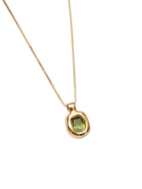 A NEW EVERYDAY FAVORITE WHAT IT IS: Elegant 14k gold vermeil necklace featuring a lab-created green sapphire WHY IT’S SPECIAL: This versatile piece serves as the perfect everyday staple We love the pop of mesmerizing green GOOD TO KNOW: 18" 14k Gold vermeil box chain14k Gold plated brass pendant with a lab-created green sapphire gemstone WHY WE LOVE WOLF CIRCUS: This line of demi-fine jewelry is crafted by hand in Vancouver, BC using a hand fabricated technique or the intricate lost-wax process. Everyday Pendant Necklace, Silver And Emerald Necklace, Green And Gold Jewelry, Gold Necklace Stack, Green Gold Jewelry, Jewelry Accessories Necklaces, Green Sapphire Necklace, Necklaces Gemstone, Minimalist Gold Necklace