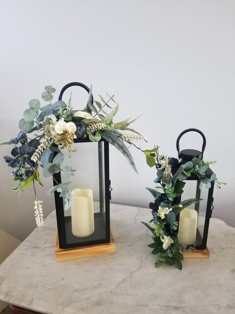 Tall Lanterns Wedding, Decorating Lanterns For Wedding, Laterns Table Centerpieces Wedding, Wedding Lantern Decor Reception Ideas, Mantle Decor With Lanterns, Ikea Lantern Ideas, Lantern Centerpieces With Flowers, Lanterns With Greenery, Lantern Centerpieces Wedding