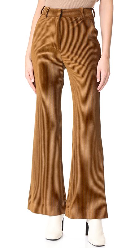 This Is Exactly What to Wear With Corduroy Pants | Who What Wear 70s Pants, Retro Pants, High Waisted Wide Leg Pants, 70s Outfits, Cloth Dress, Shirt Sweater, Ribbed Knit Sweater, Pants Design, Menswear Inspired