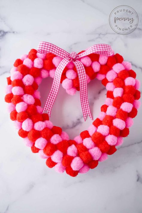 Give your front door a makeover for Valentine's Day on a budget with this DIY Dollar Tree Heart Wreath This DIY valentines day wreath only costs $5 to make and takes less than 30 minutes to put together! You can get most of the supplies for this DIY wreath at Dollar Tree. This is a fun valentine's day craft for adults to make in February and is a great DIY valentine's day decor idea. Dollar Tree Heart Wreath, Heart Doilies, Heart Wreath Diy, Burlap Diy, Grapevine Garland, Heart Shaped Wreath, Diy Valentines Day Wreath, Romantic Diy, Valentine Wreath Diy