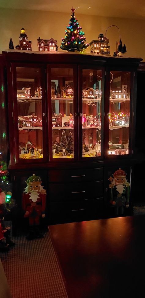 Holiday China Cabinet Display, Christmas Village Display Cabinet, Christmas Village China Cabinet, Christmas Village Cabinet Display, Christmas Mini Houses Display, Christmas China Cabinet Display, Decorating China Cabinet For Christmas, Christmas Village In China Cabinet, China Cabinet Christmas Display