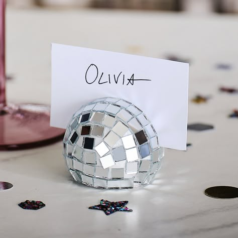 The Christmas disco trend marries groove and tradition | Ideal Home Ball Table Decorations, Disco Ball Table, Christmas Place Card Holders, Silver Disco Ball, Christmas Place Settings, Disco Birthday Party, Christmas Place Cards, Ginger Ray, Disco Theme