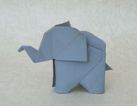 origami elephant | can anyone tell me who is the folder of t… | soneblees | Flickr Origami Elephant Tattoo, Dragon Origami, Origami Cube, Origami Elephant, Origami Gifts, Tutorial Origami, Origami Decoration, Water Coloring, Cute Origami