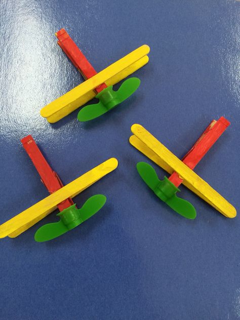 These cute biplanes are made with craft sticks, a clothes pin and the twist caps from apple squeezer pouches. The children painted the craft sticks first and the wings and propeller were hot glued on. Go Go Squeeze, Beaver Scouts, Alphabet Crafts Preschool, Craft Sticks, Alphabet Crafts, Squeeze Pouch, Plastic Caps, Kid Toys, The Wings