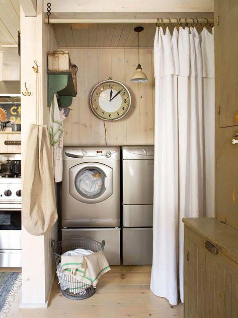 An excellent way to hide your kitchen laundry center is with a simple curtain. The extra space that this curtain leaves in the laundry room creates hidden storage space for clean laundry or detergent. #basementlaundryroom Hidden Laundry Rooms, Laundry Room Curtains, Vintage Laundry Room Decor, Laundry Room Decorating, Clever Closet, Laundry Nook, Hidden Laundry, Vintage Laundry Room, Mini Loft