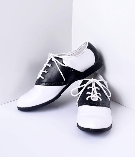 Saddle Shoes History Black  White Classic Lace Up Saddle Shoes $48.00 AT vintagedancer.com 1950s Fashion Shoes, 50s Shoes, 1950s Shoes, Pin Up Shoes, Saddle Oxfords, Vintage Inspired Shoes, Vintage Style Shoes, Saddle Shoes, Black And White Shoes