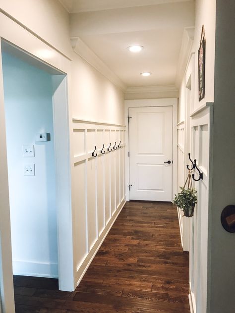 Hallway To Garage Entryway, Garage Hallway Ideas, Hallway From Garage To House, Board And Batten Wall Long Hallway, Entrance From Garage To House, Garage Foyer Entry Ways, Long Mudroom Hallway, Garage Entrance To House Entryway, Garage Entry Hallway Ideas