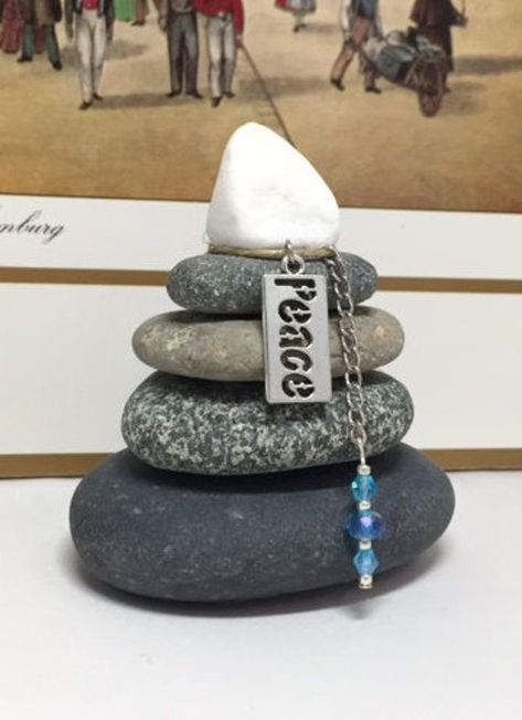 "Your Rock Cairn will be of similar size to the one shown. Rock colors vary. Please let me know if you would like a different bead color. Silver Peace Rock Cairn (approximately 3\"- 4\"tall) decorated with beautiful beads dangling from silver chain. Felt bottom to avoid scratching desk/table/shelf.  OOAK. \"When the power of love overcomes the love of power the world will know peace.\" - Jimi Hendrix Cairn - A mound of stones erected as a landmark or memorial... Cairns can be given for Encourage Stacked Stones, Rock Cairn, Find Joy In The Journey, Gratitude Meditation, Joy In The Journey, Wishing Stones, Rock Sculpture, Meditation Altar, Hippie Love