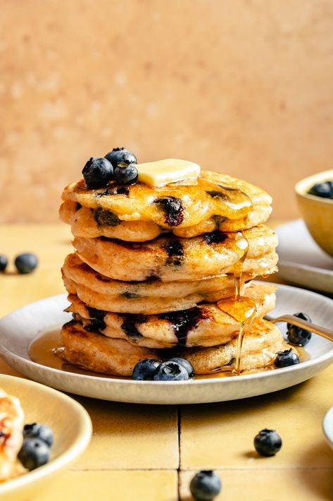 My Grandma Gloria's fluffiest buttermilk blueberry pancakes made with simple ingredients and lots of love. These pancakes are a staple in my house and even pack over 10g of protein for the perfect breakfast kiddos and adults will love! Add your fav topping and dig into this classic recipe. Oatmeal Protein Pancakes, Buttermilk Blueberry, Blueberry Buttermilk Pancakes, Healthy Breakfast Choices, Blueberry Pancakes Recipe, Yogurt Pancakes, Ambitious Kitchen, Dinner Side Dishes, Blueberry Pancakes