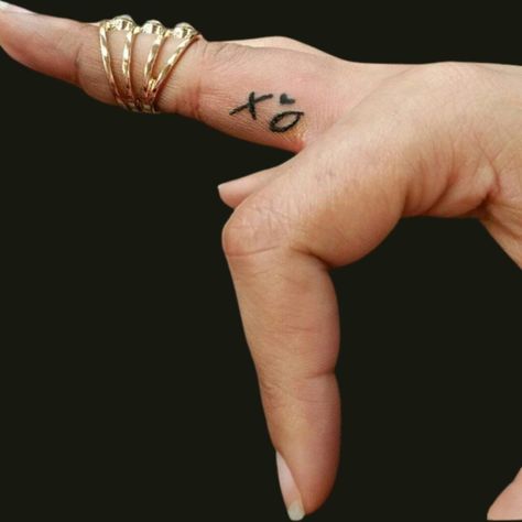 25 Adorable XO Tattoos To Spread Love And Affection Xo Logo Design, He Would Love First Tattoo, Xo Tattoo The Weeknd, Ovo Tattoo, The Weeknd Tattoo, Xoxo Tattoo, Mini Tattoo Ideas, Smiley Face Tattoo, Xo Tattoo